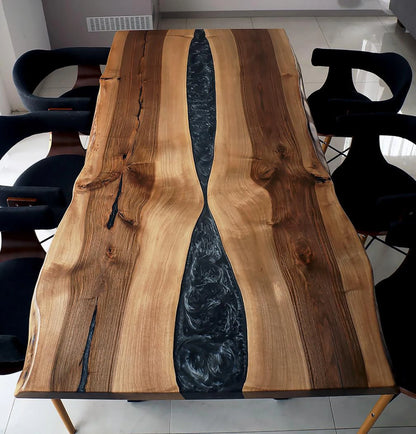 Black Epoxy River on a Walnut Live Edge Dining Table