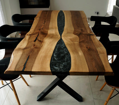 Black Epoxy River on a Walnut Live Edge Dining Table