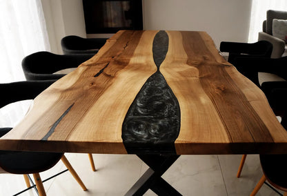 Black Epoxy River on a Walnut Live Edge Dining Table